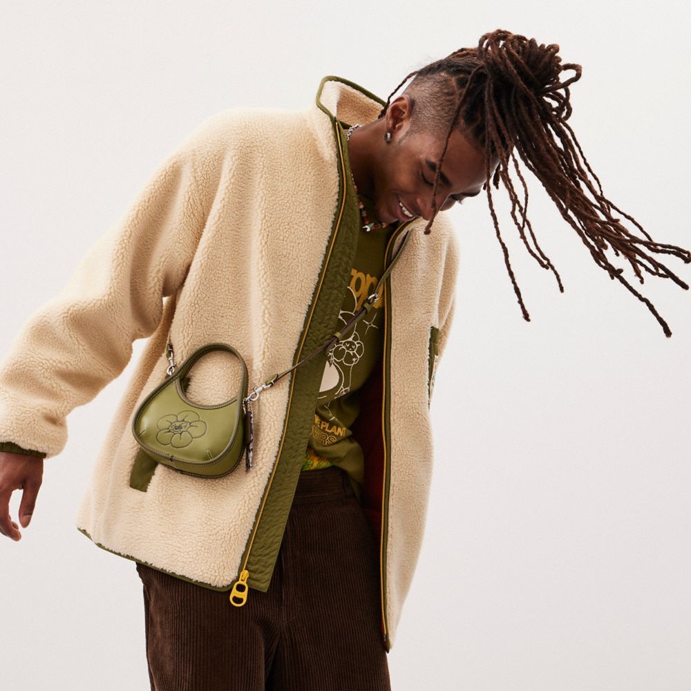 COACH®,Mini Ergo Bag In Coachtopia Leather With Flower Print,,Detail View