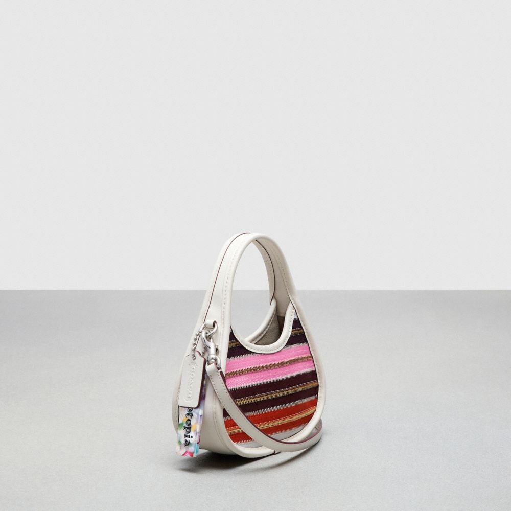 COACH®,Mini Ergo Bag In Upcrafted Zippers,Leather,Hobo,Plastic,Zipper Trim,Tag Embellishment,Compact,Silver Metal,Casual,Multi Color,Angle View
