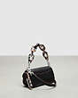 COACH®,Mini Wavy Dinky Bag with Crossbody Strap in Coachtopia Leather,Coachtopia Leather,Mini,Black,Angle View