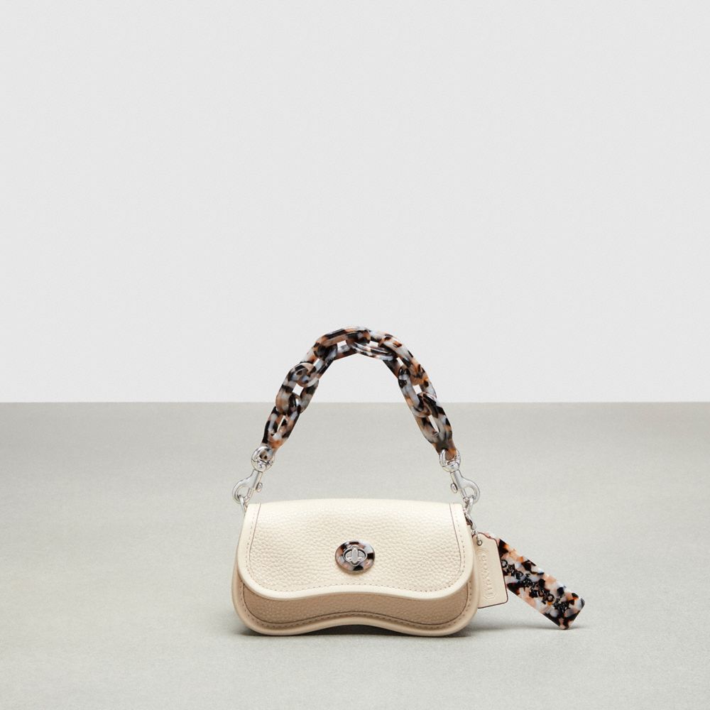Shop Coach Outlet Mini Wavy Dinky Bag With Crossbody Strap In Coachtopia Leather In White