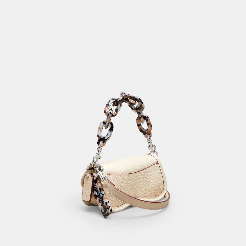 COACH®,Mini Wavy Dinky Bag With Crossbody Strap In Coachtopia Leather,Coachtopia Leather,Mini,Cloud,Angle View