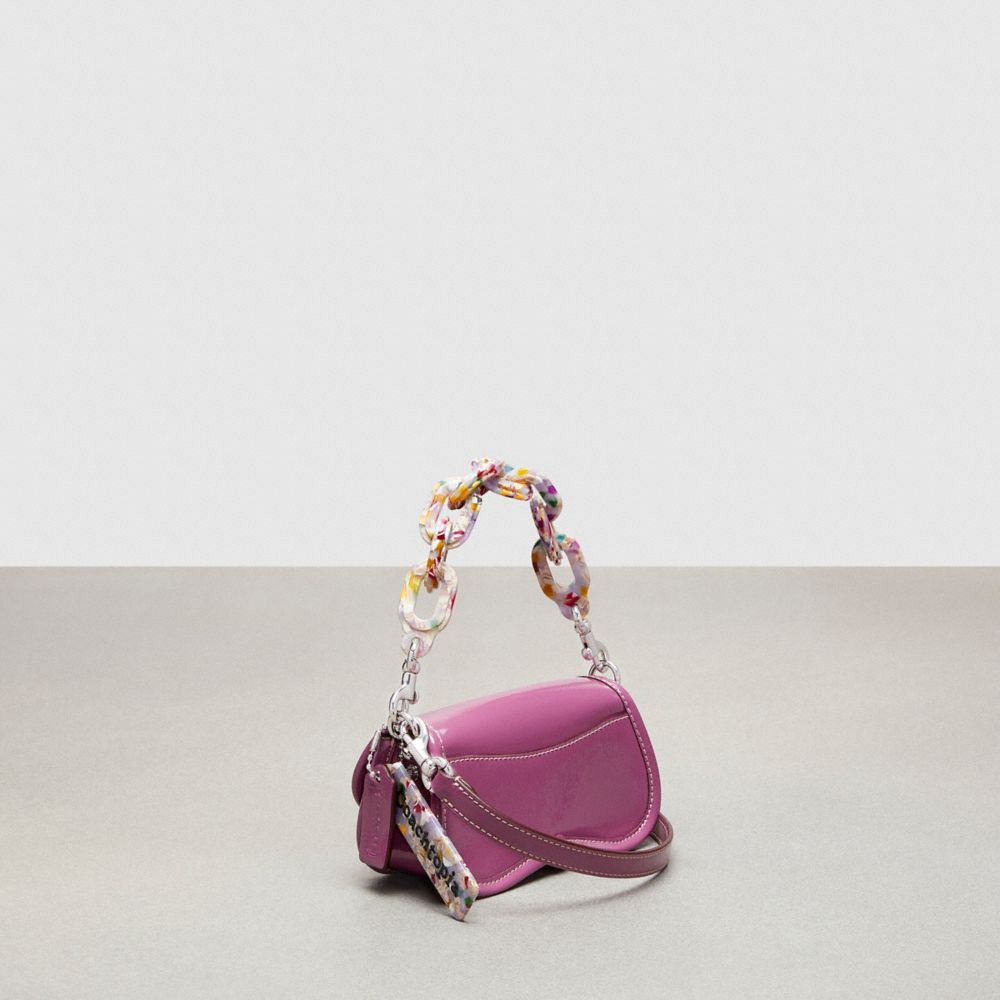 COACH®,Mini sac Dinky ondulé avec sangle porté-croisé en cuir verni froissé,Cuir Coachtopia,Baies lilas,Angle View