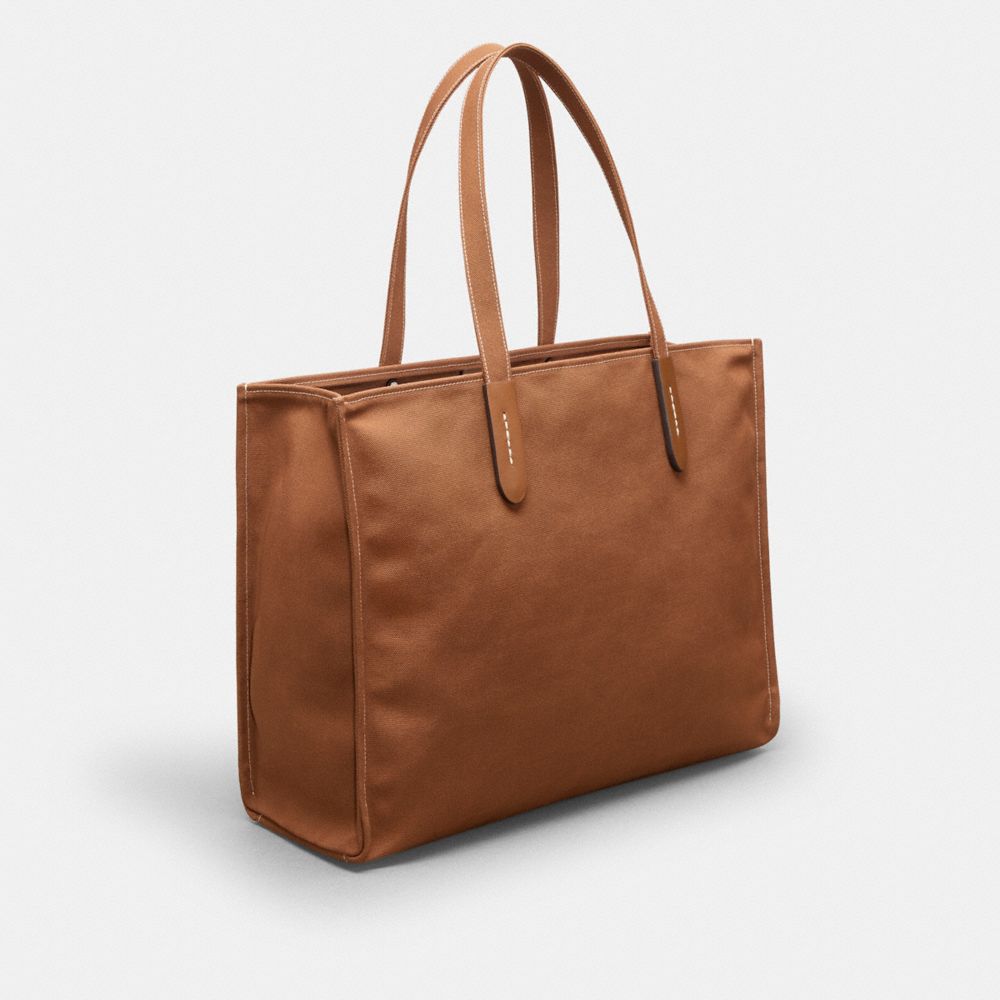 COACH®,Fourre-tout en toile recyclée à 100 % : Créatures Coachtopia,Polyester recyclé,Brun sombre Multi,Angle View