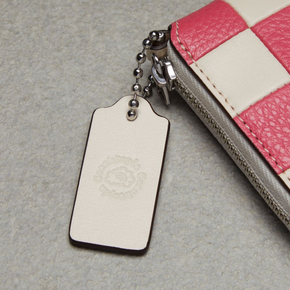 Coach zip around store wristlet