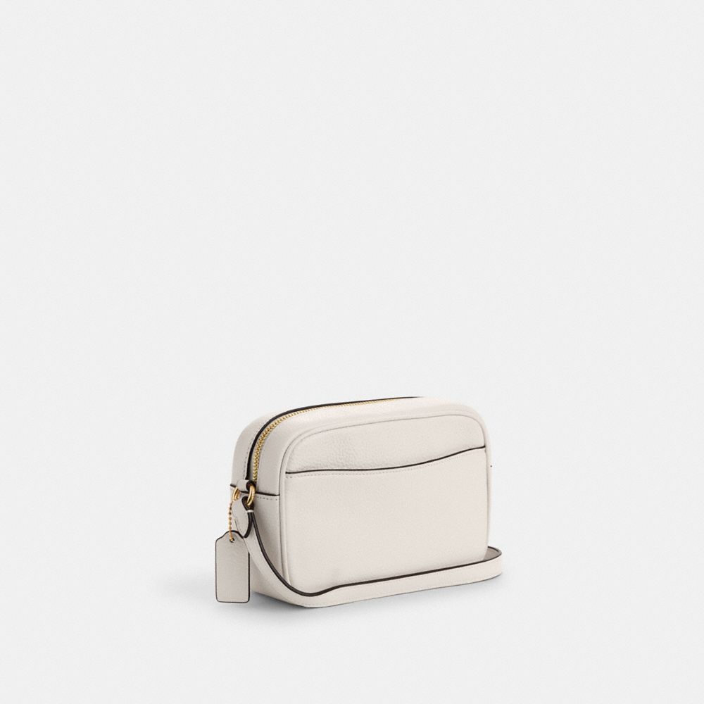 COACH®,MINI SAC POUR APPAREIL PHOTO JAMIE,Cuir galet,Or/Craie,Angle View