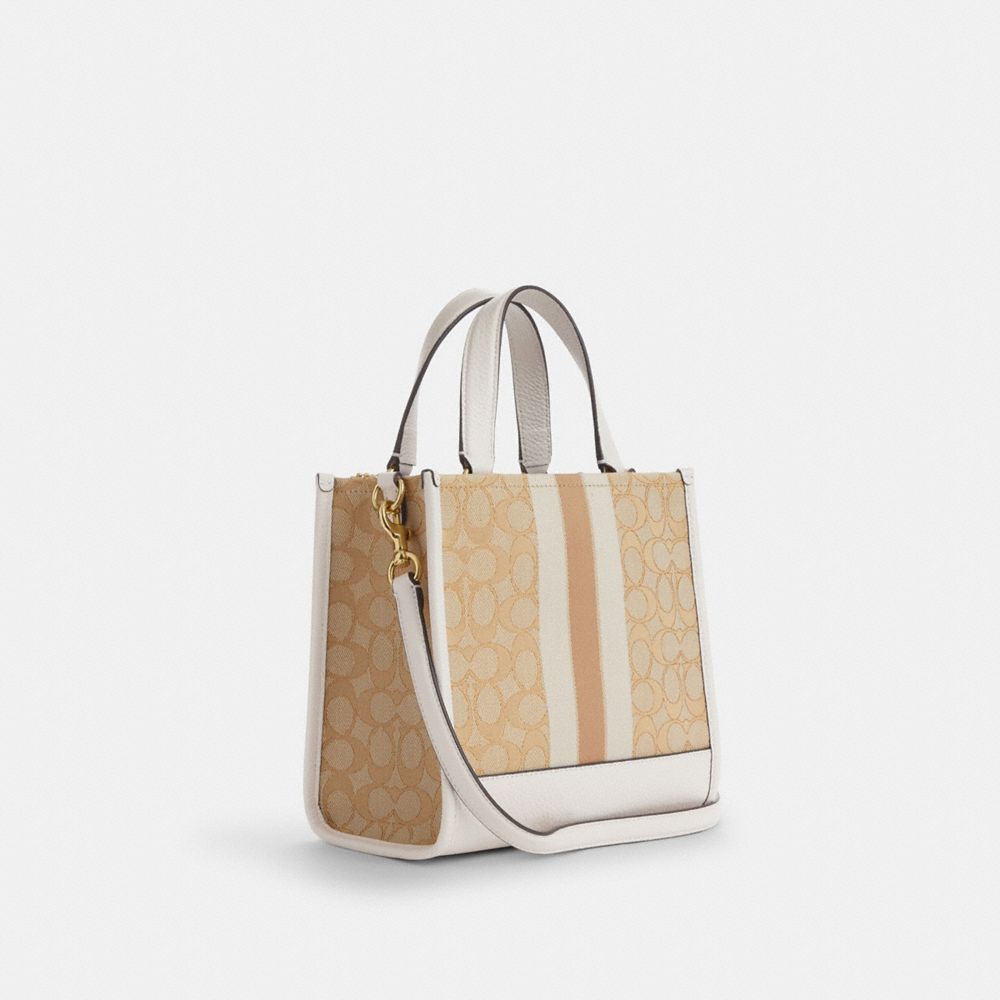 COACH®,CABAS DEMPSEY 22 EN JACQUARD SIGNATURE AVEC RAYURE ET RENFORT COACH,Jacquard,Or/Kaki pâle Craie,Angle View