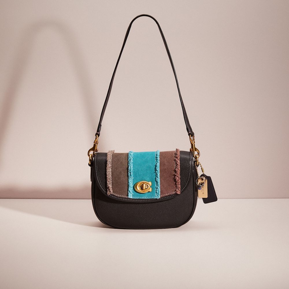 COACH®,UPCRAFTED WILLOW SADDLE BAG,Polished Pebble Leather,Small,Denim Dream,Brass/Black,Front View