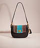 COACH®,UPCRAFTED WILLOW SADDLE BAG,Polished Pebble Leather,Small,Denim Dream,Brass/Black,Front View