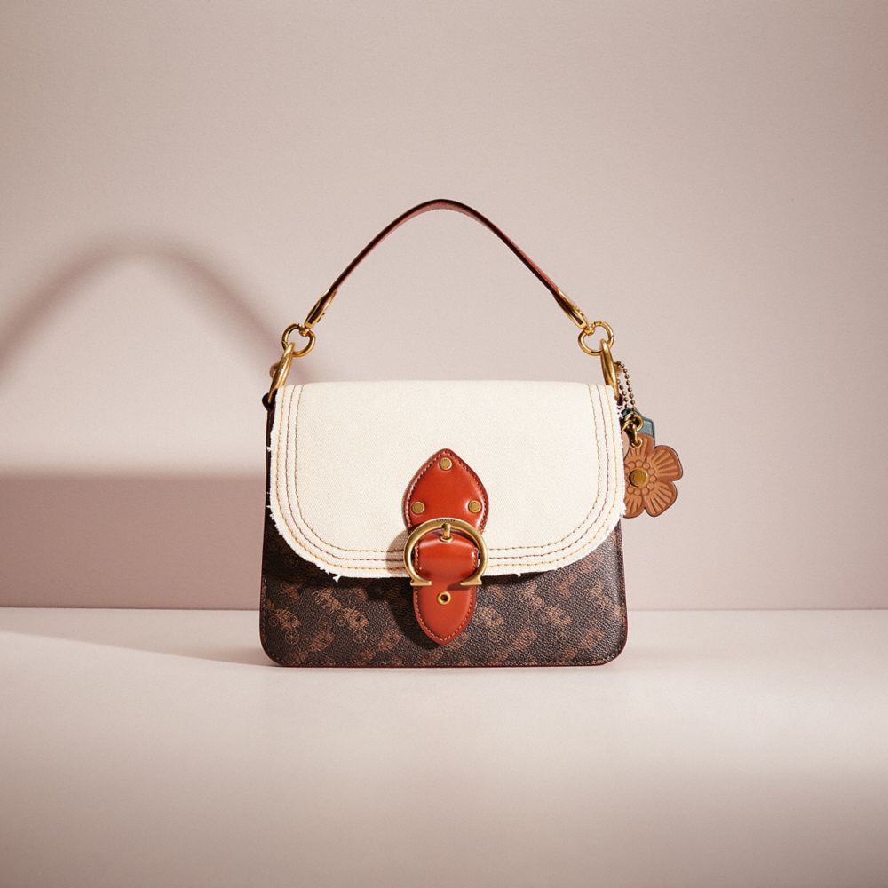 Handbag Designer By Coach Size: Medium