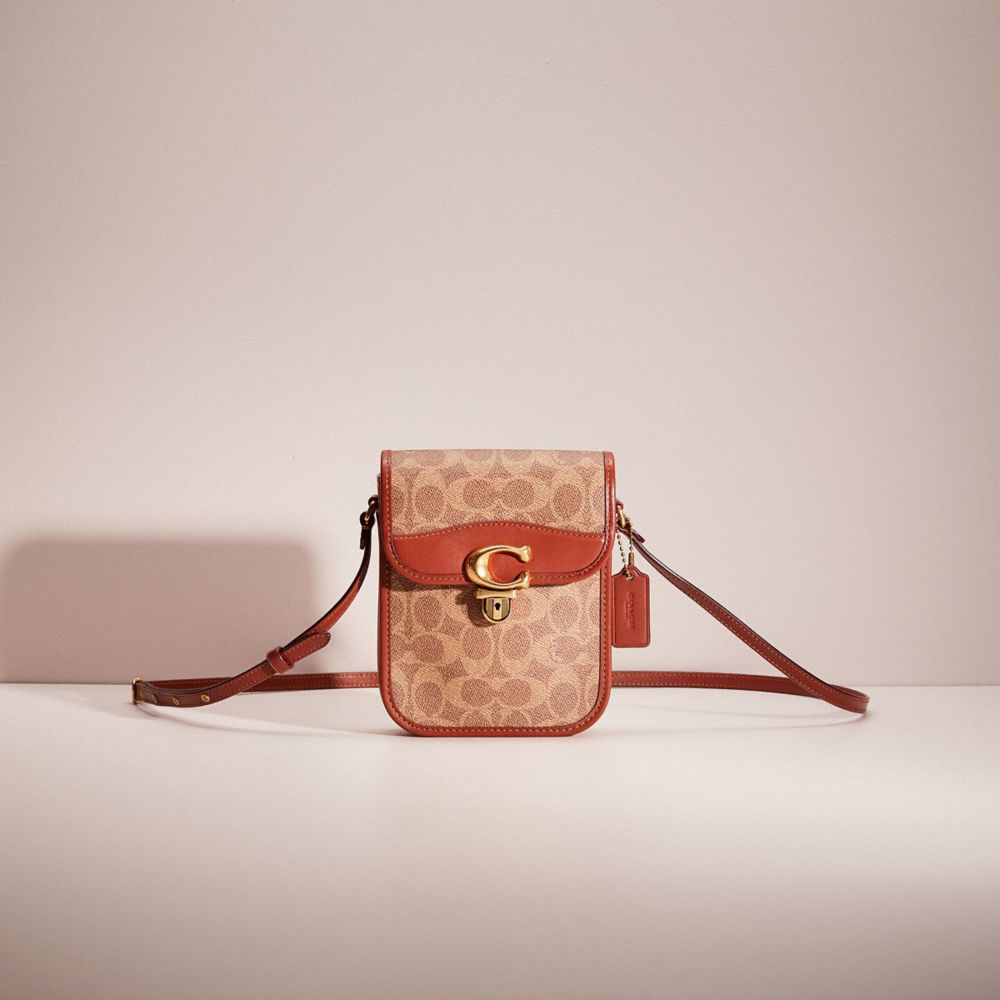 COACH®,RESTORED TALL STUDIO CROSSBODY IN SIGNATURE CANVAS,Brass/Tan/Rust,Front View