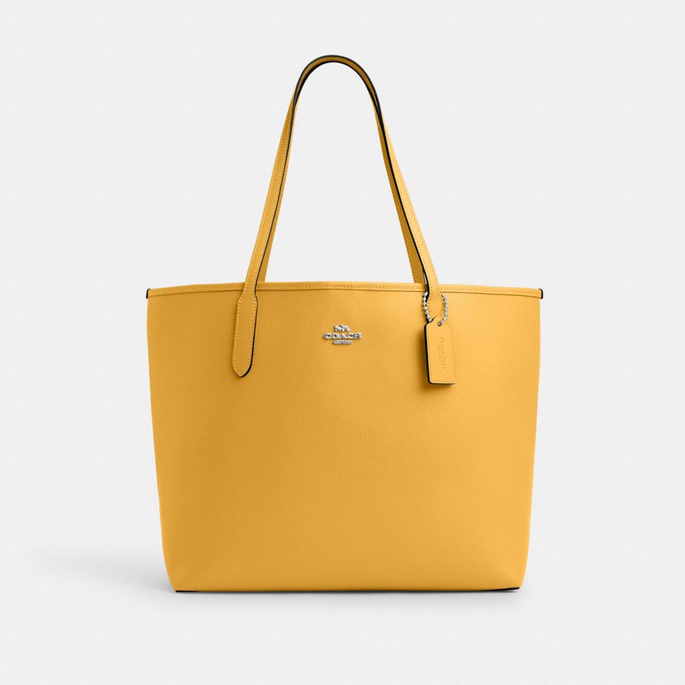 Shop Coach Outlet City Tote Bag In Yellow