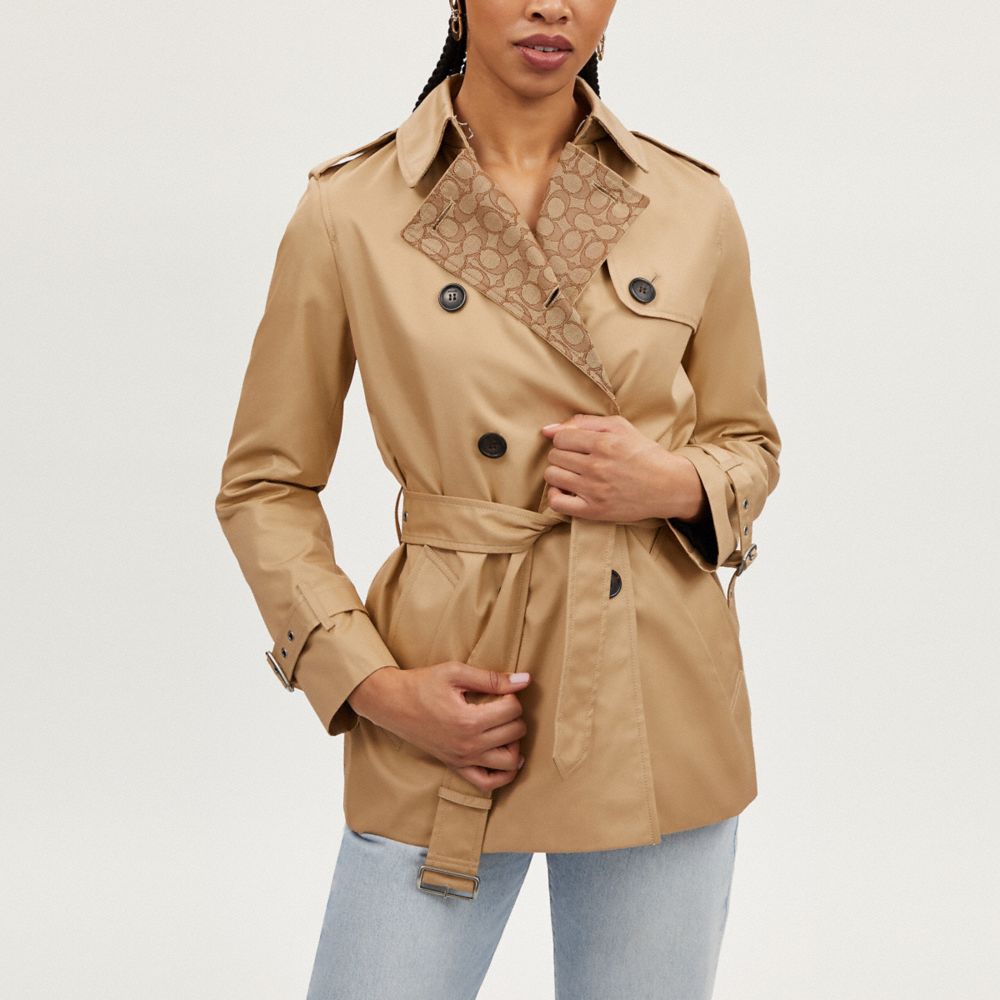 COACH®,Signature Lapel Short Trench,Recycled Polyester,Cotton,Polyester,Organic Cotton,Trench,Button,Logo,Work,Beige,Detail View