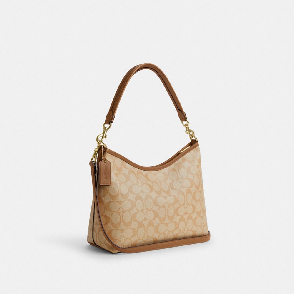 COACH®,Laurel Shoulder Bag In Signature Canvas,Canvas,Hobo,Piping,Logo,Gold Metal,Casual,Beige,Angle View