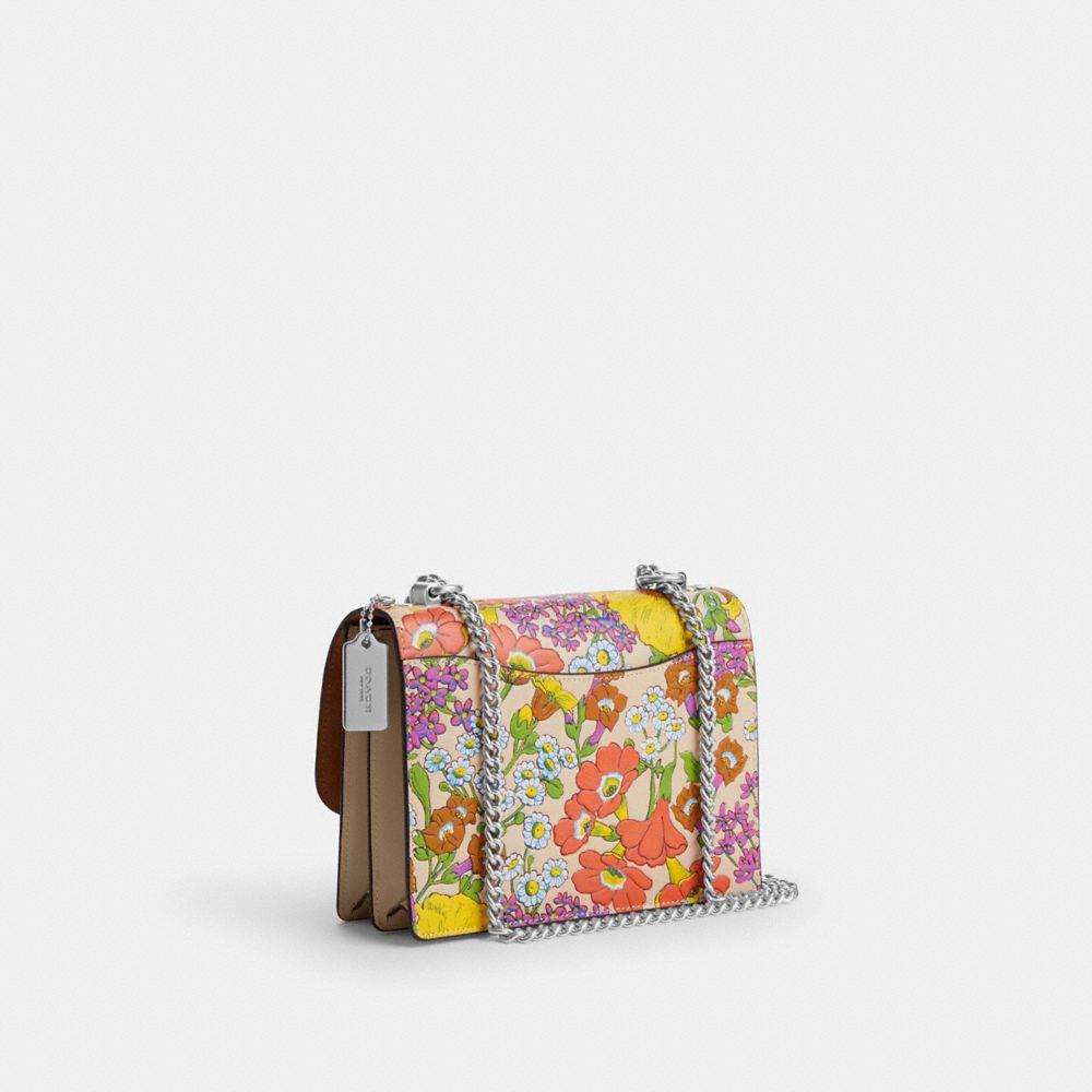 COACH®,KLARE CROSSBODY BAG WITH FLORAL PRINT,Novelty Leather,Medium,Silver/Ivory Multi,Angle View
