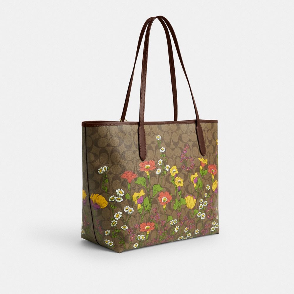 COACH®,CITY TOTE BAG IN SIGNATURE CANVAS WITH FLORAL PRINT,Signature Canvas,X-Large,Gold/Khaki Multi,Angle View