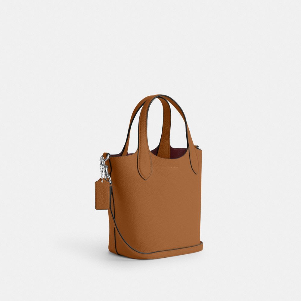 COACH®,HANNA BUCKET BAG,Pebbled Leather,Medium,Silver/Light Saddle,Angle View