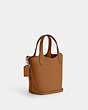 COACH®,HANNA BUCKET BAG,Leather,Medium,Silver/Light Saddle,Angle View