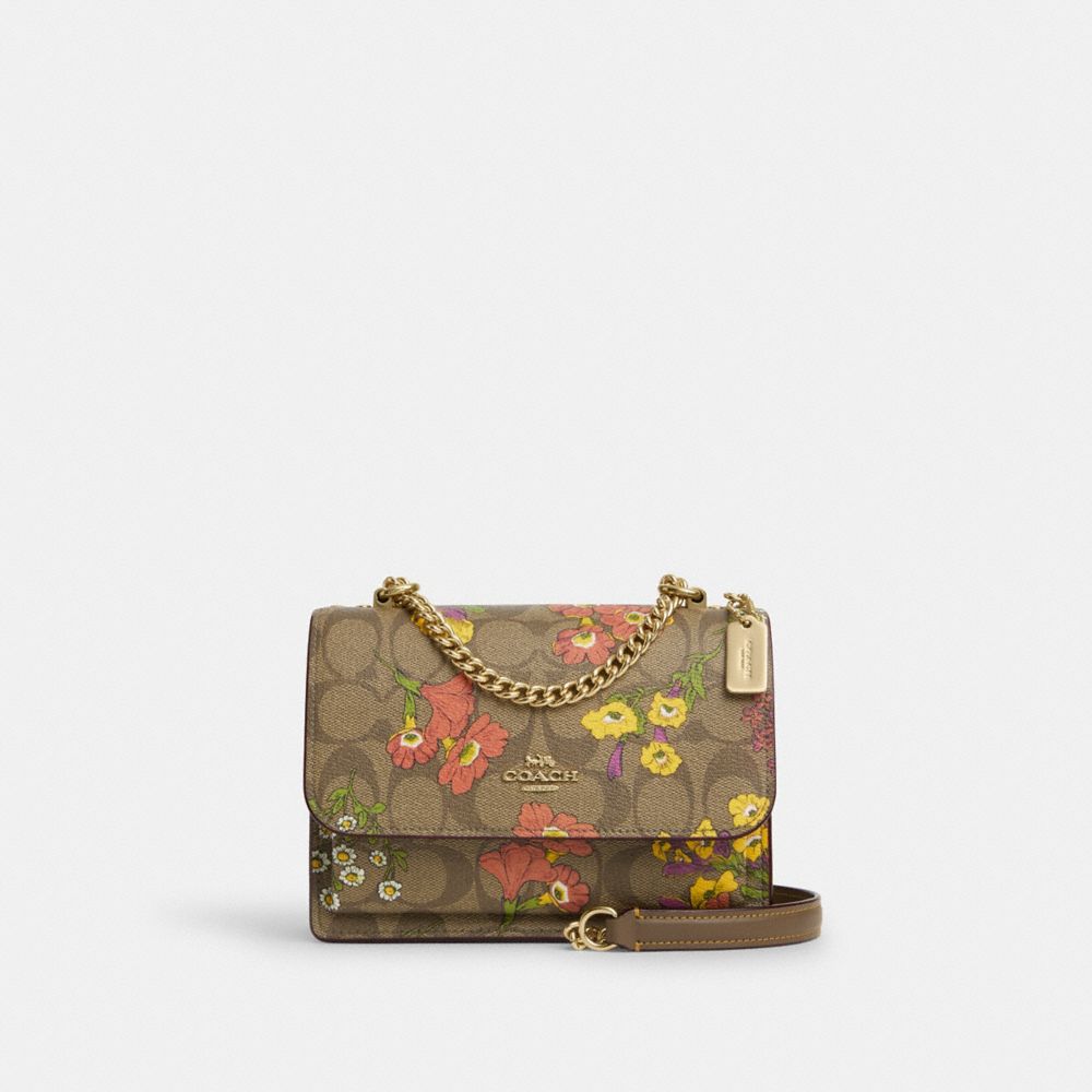 COACH®,MINI KLARE CROSSBODY IN SIGNATURE CANVAS WITH FLORAL PRINT,Signature Canvas,Mini,Gold/Khaki Multi,Front View