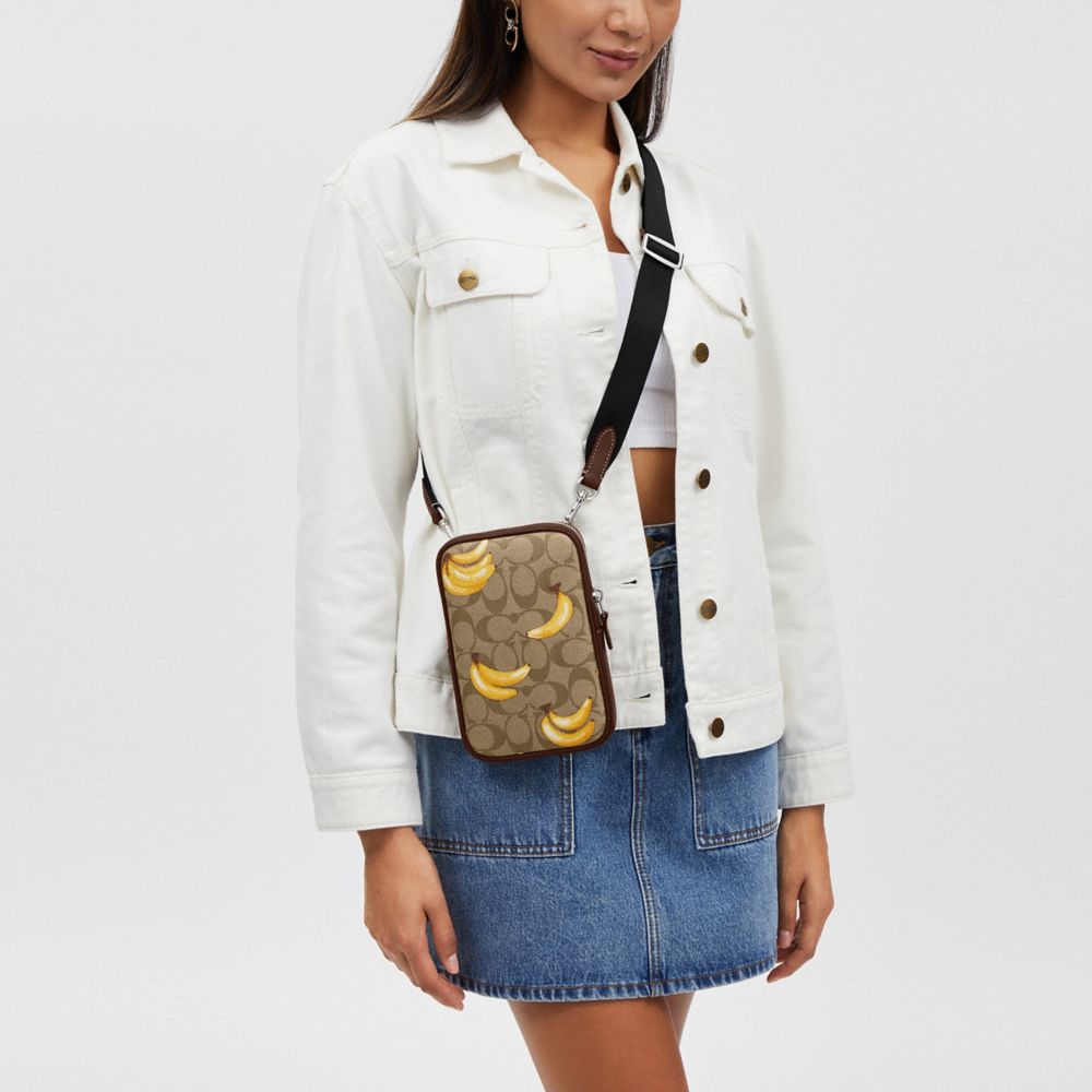 COACH®,Aden Crossbody Bag In Signature Canvas With Banana Print,Canvas,Calfskin Leather,Crossbody,Casual,Brown,Angle View