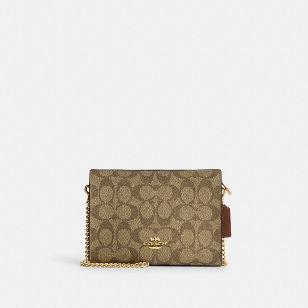 Boxed anna foldover crossbody clutch in signature canvas new arrivals