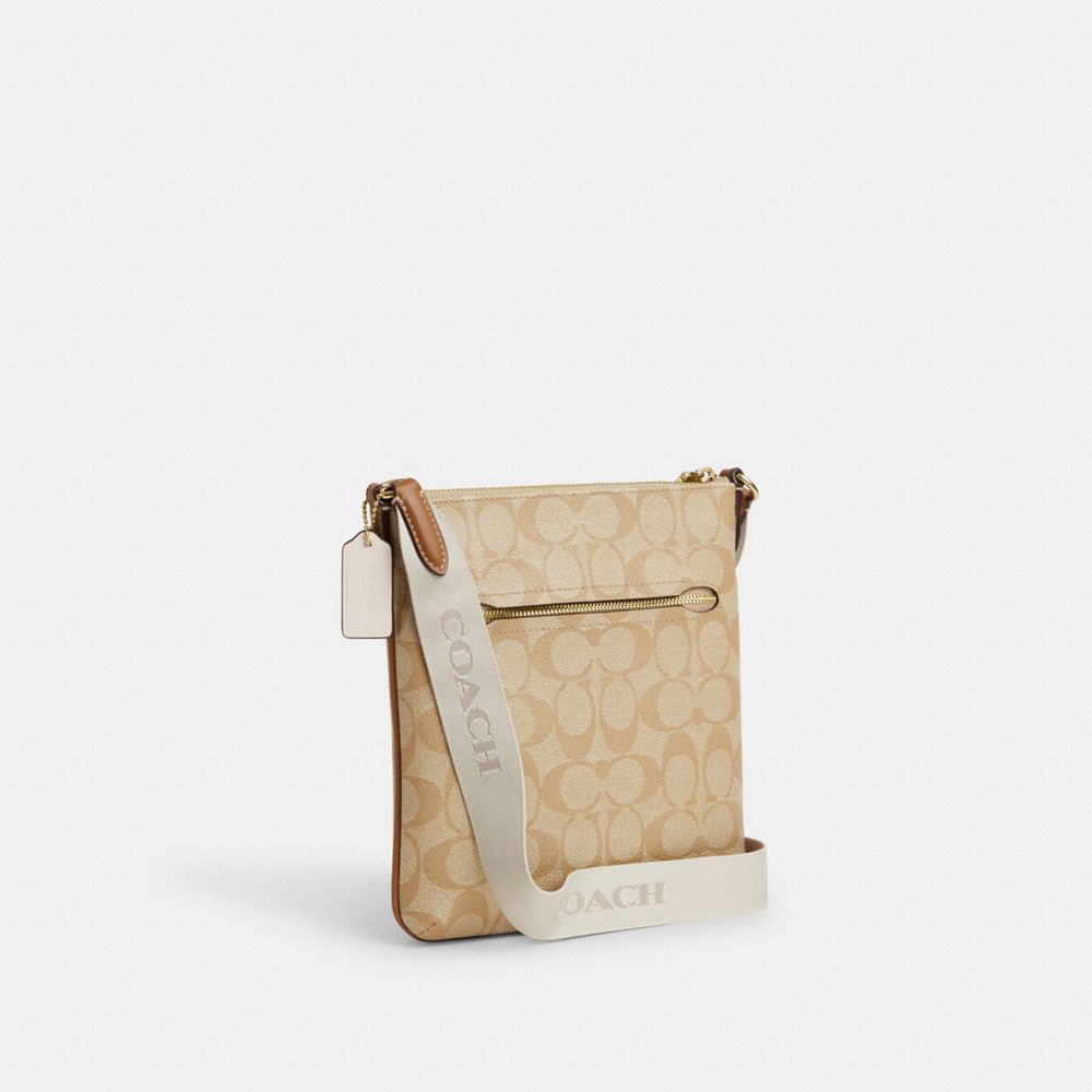 COACH®,MINI ROWAN FILE BAG IN SIGNATURE CANVAS WITH STRIPE,Signature Canvas,Im/Light Khaki/Chalk Lt Saddle,Angle View