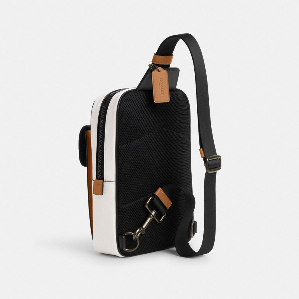COACH®,TRACK PACK IN COLORBLOCK SIGNATURE CANVAS,Signature Canvas,Medium,Black Antique Nickel/Charcoal/Chalk/Light Saddle,Angle View