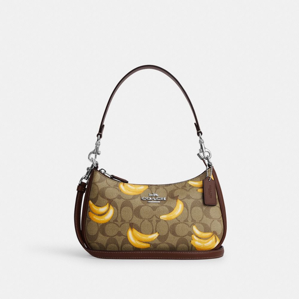 COACH®,TERI SHOULDER BAG IN SIGNATURE CANVAS WITH BANANA PRINT,Signature Canvas,Silver/Khaki/Dark Saddle,Front View image number 0