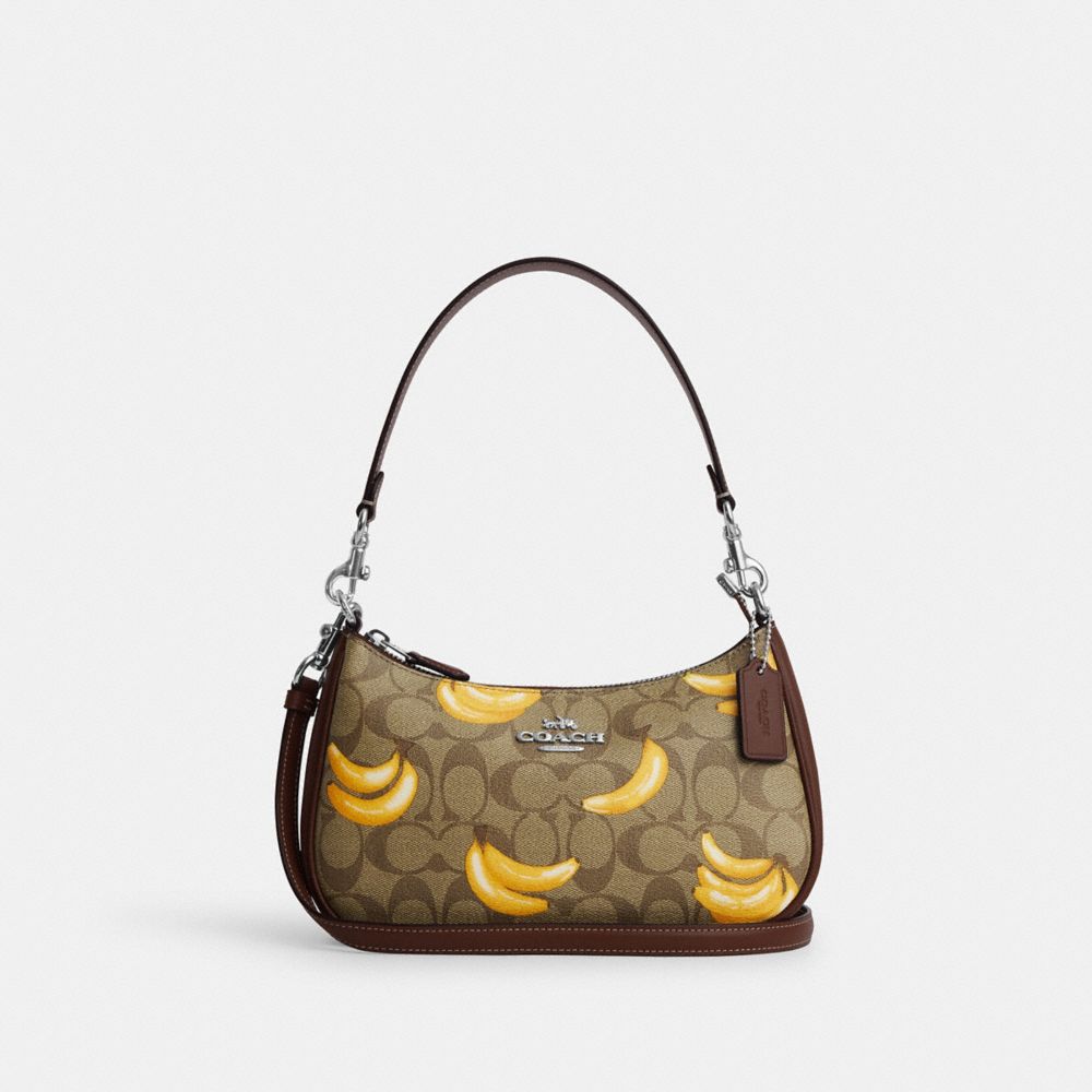 COACH®,TERI SHOULDER BAG IN SIGNATURE CANVAS WITH BANANA PRINT,pvc,Silver/Khaki/Dark Saddle,Front View