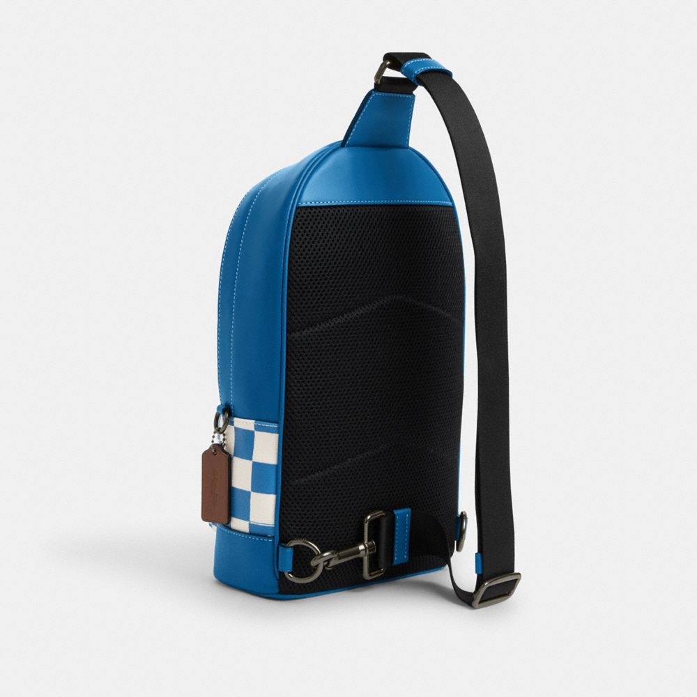 COACH®,WEST PACK WITH CHECKERBOARD PRINT,Novelty Print,Medium,Black Antique Nickel/Blue Jay/Chalk,Angle View