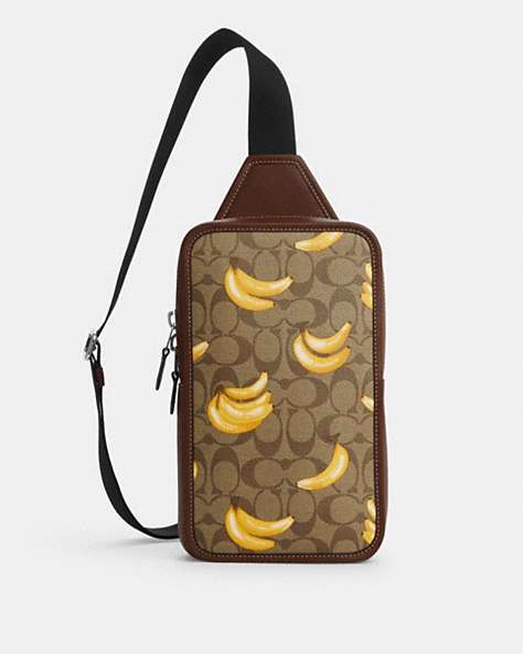 COACH®,SULLIVAN PACK IN SIGNATURE CANVAS WITH BANANA PRINT,pvc,Silver/Khaki/Dark Saddle,Front View