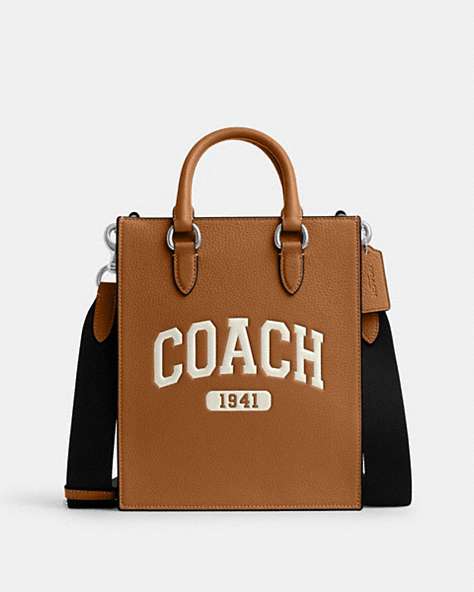 COACH®,DYLAN TOTE WITH VARSITY,Leather,Medium,Silver/Light Saddle,Front View
