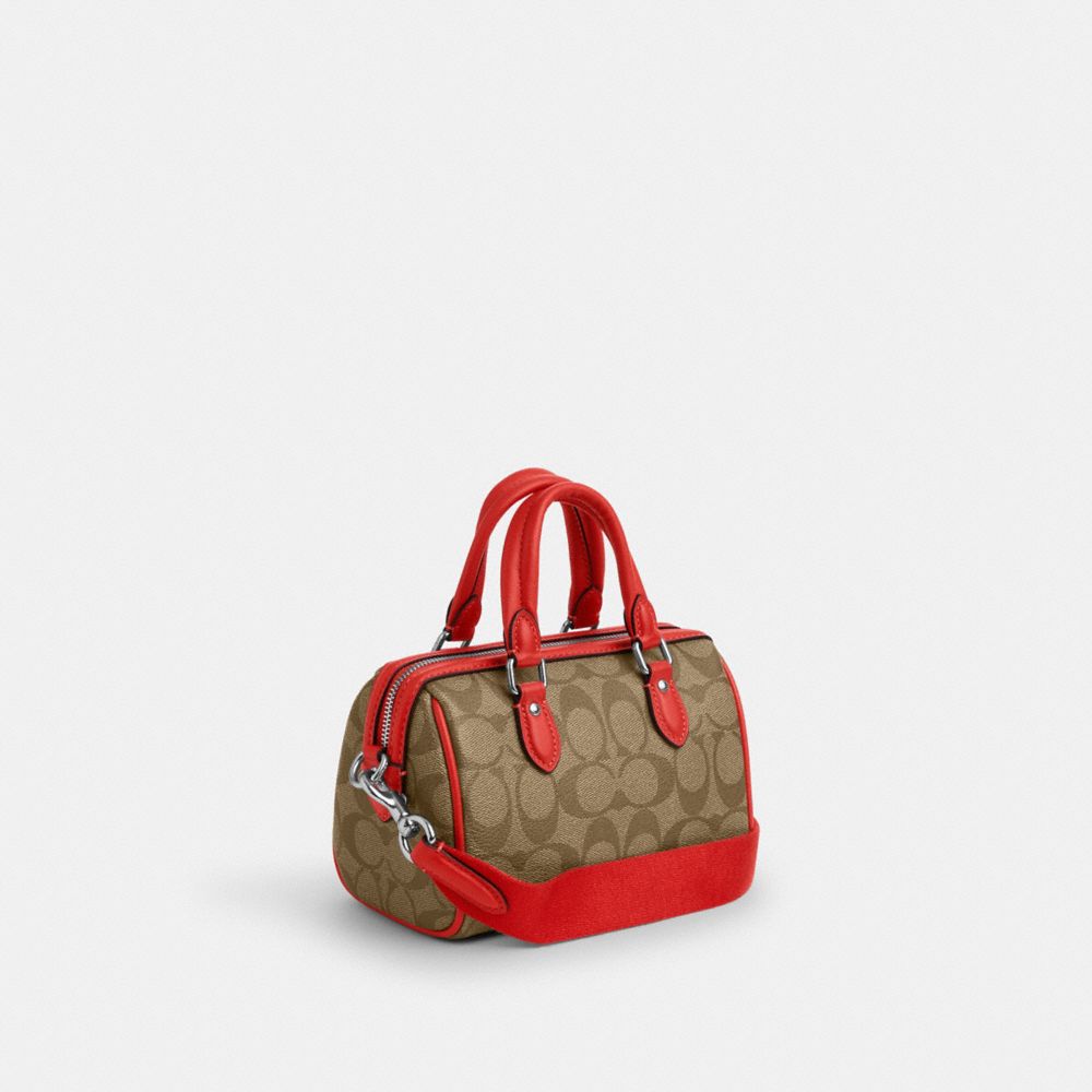 COACH®,MINI SAC BANDOULIÈRE ROWAN EN TOILE EXCLUSIVE,Tissu en toile exclusif,Argent/Kaki/Rouge Miami,Angle View