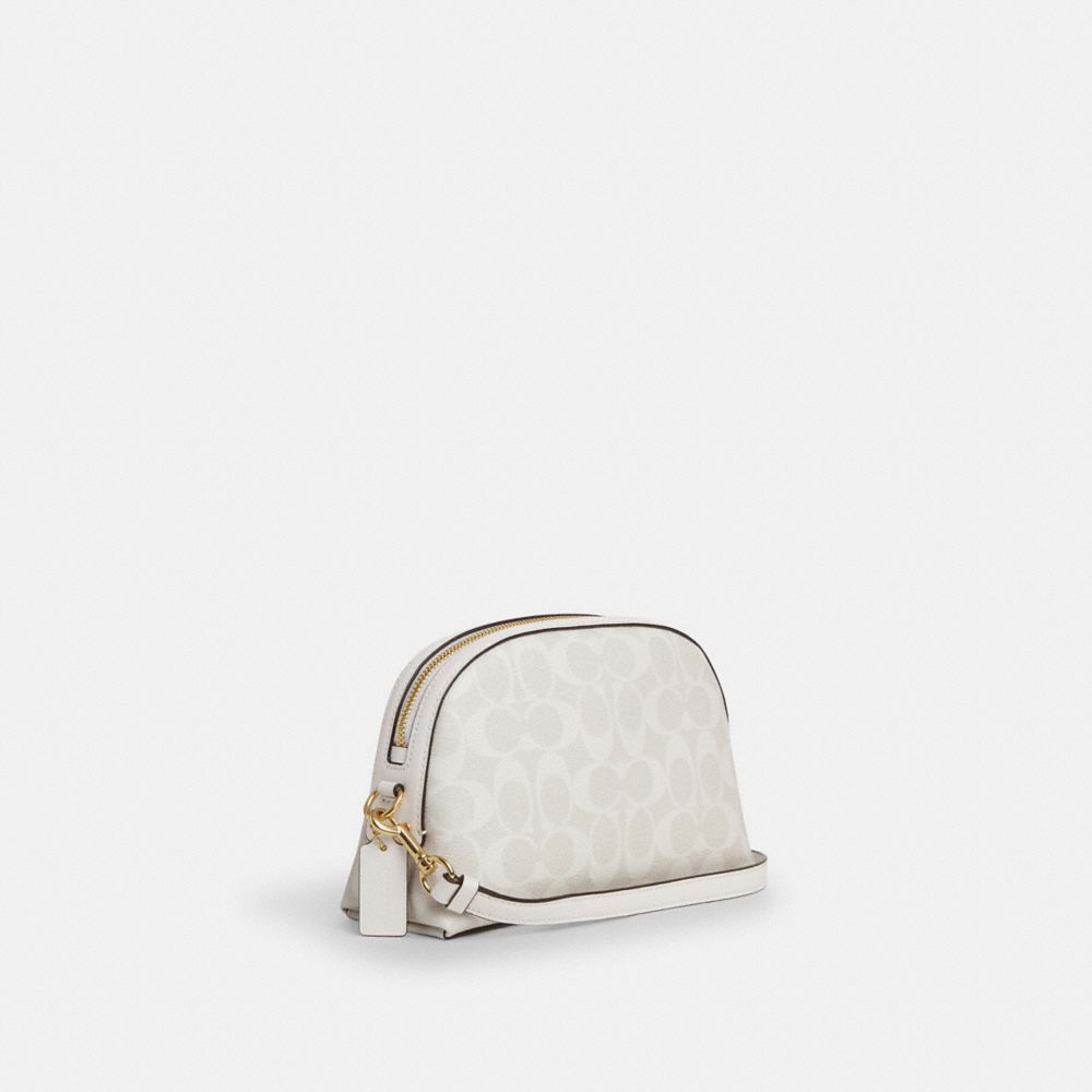 COACH®,PORTÉ-CROISÉ MADI EN TOILE SIGNATURE,Toile exclusive,Or/Craie/Blanc glacier,Angle View