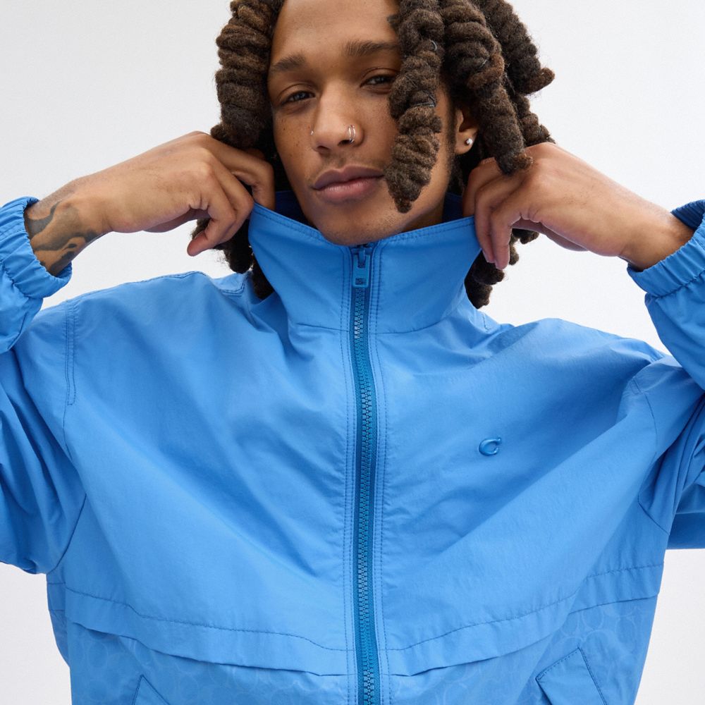 COACH®,Windbreaker,Recycled Polyester,Polyamide,Windbreaker,Logo,Metal,Sustainable,Ripstop,Casual,Blue,Detail View