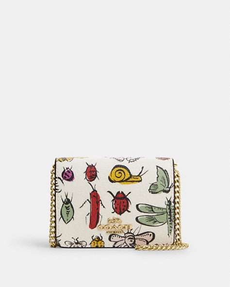 COACH®,MINI WALLET ON A CHAIN WITH CREATURE PRINT,pvc,Gold/Chalk Multi,Front View