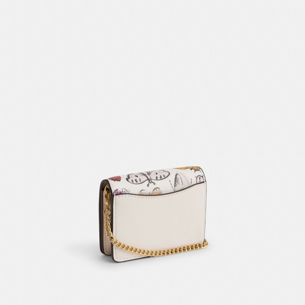 COACH®,MINI WALLET ON A CHAIN WITH CREATURE PRINT,Novelty Print,Gold/Chalk Multi,Angle View