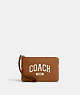 COACH®,CORNER ZIP WRISTLET WITH VARSITY,Leather,Silver/Light Saddle,Front View