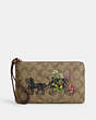 COACH®,LARGE CORNER ZIP WRISTLET IN SIGNATURE CANVAS WITH FLORAL HORSE AND CARRIAGE,pvc,Gold/Khaki Multi,Front View
