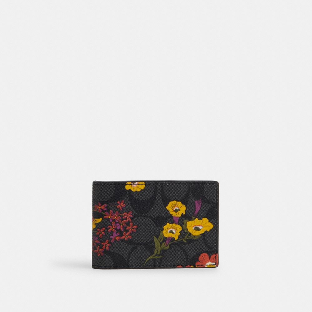 COACH®,COMPACT BILLFOLD WALLET IN SIGNATURE CANVAS WITH FLORAL PRINT,Signature Canvas,Gunmetal/Charcoal Multi,Front View image number 0