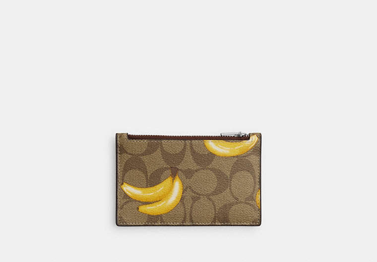 COACH®,ZIP CARD CASE IN SIGNATURE CANVAS WITH BANANA PRINT,pvc,Silver/Khaki/Dark Saddle,Front View image number 0