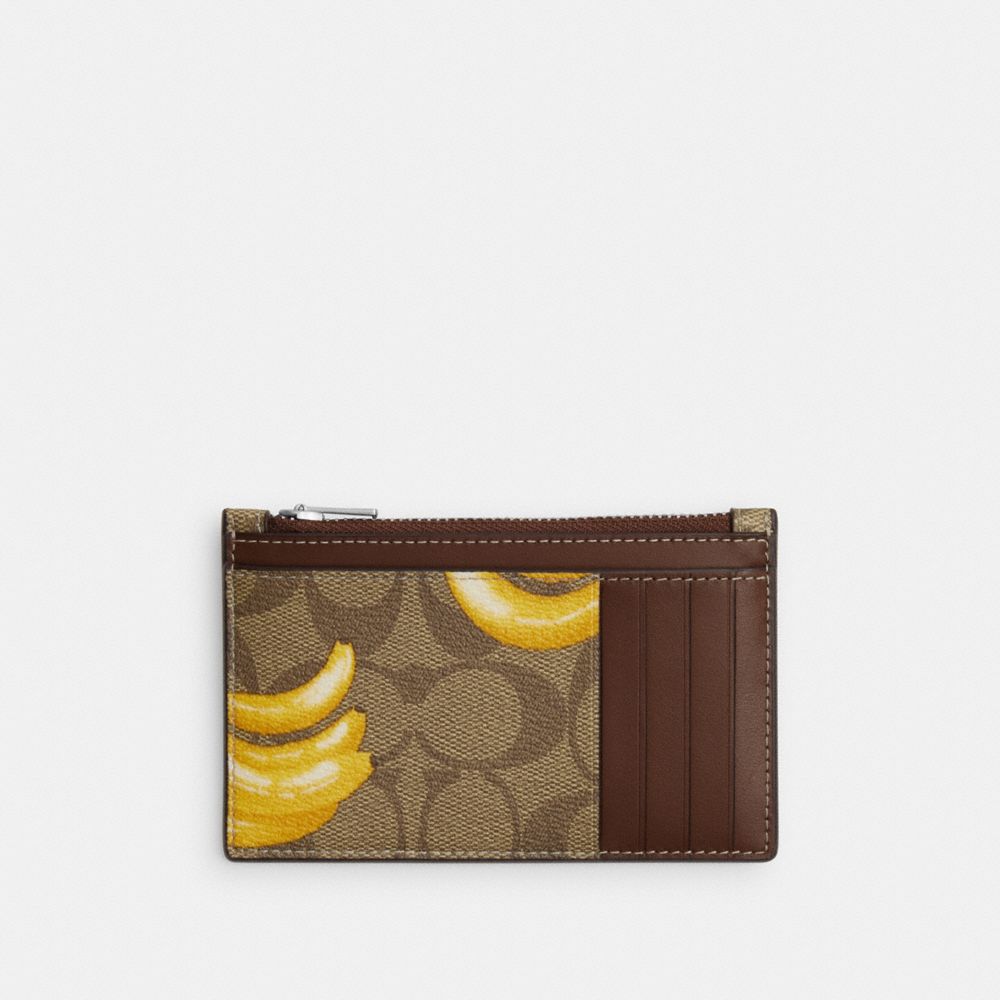 COACH®,ZIP CARD CASE IN SIGNATURE CANVAS WITH BANANA PRINT,Signature Canvas,Mini,Silver/Khaki/Dark Saddle,Back View