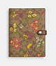 COACH®,NOTEBOOK IN SIGNATURE CANVAS WITH FLORAL PRINT,pvc,Gold/Khaki Multi,Front View