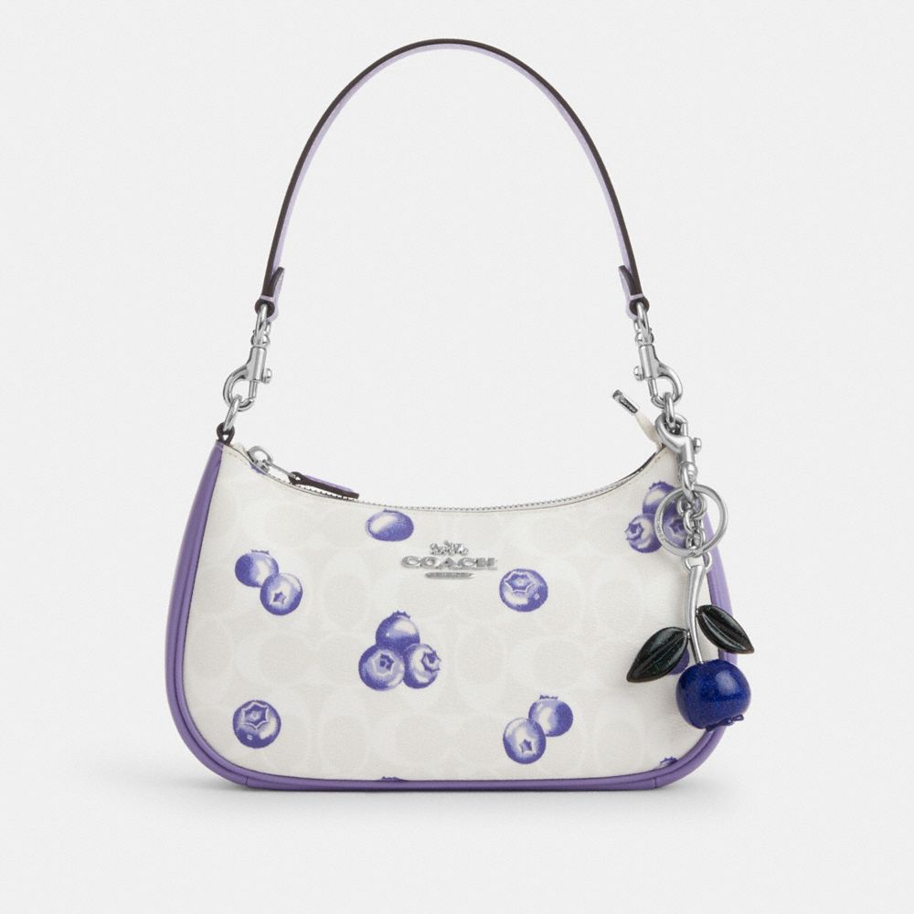 COACH®,Glitter Blueberry Bag Charm,Key Chain,Resin,Metal Material,Silver Metal,Blue,Angle View