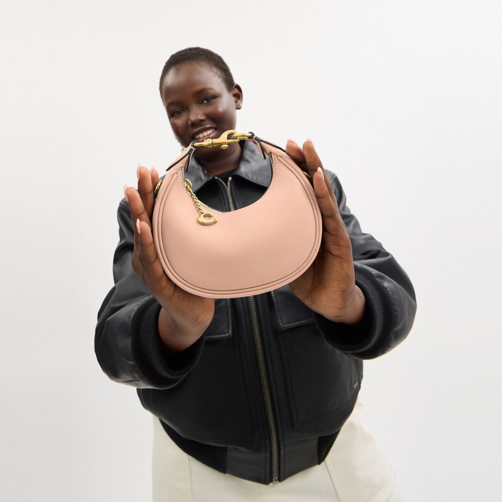 COACH®,Jonie Bag,Leather,Crossbody,Logo,Metal,Embossed,Compact,Gold Metal,Day Party,,Detail View