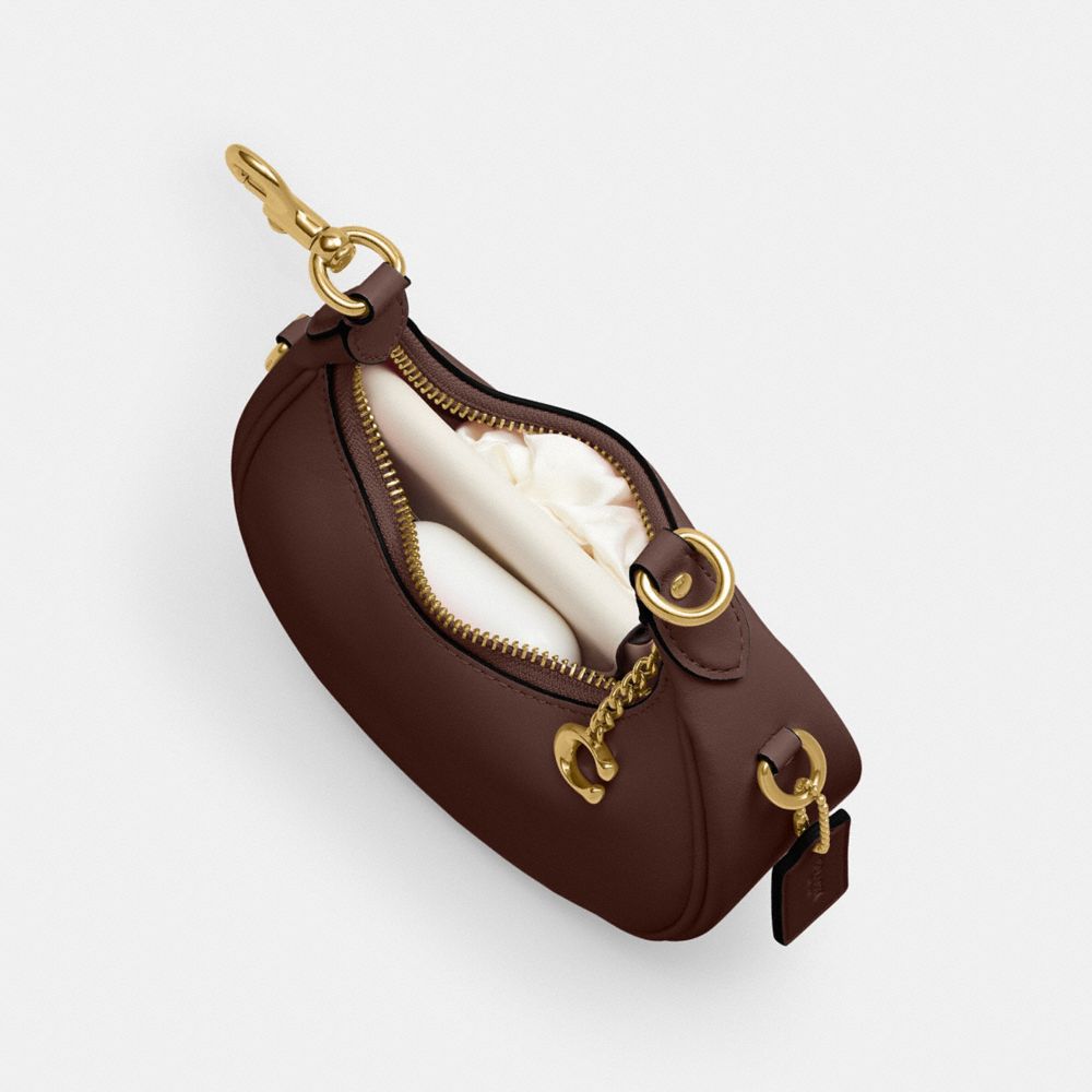 COACH®,Jonie Bag,Leather,Crossbody,Logo,Metal,Embossed,Compact,Gold Metal,Day Party,,Inside View,Top View