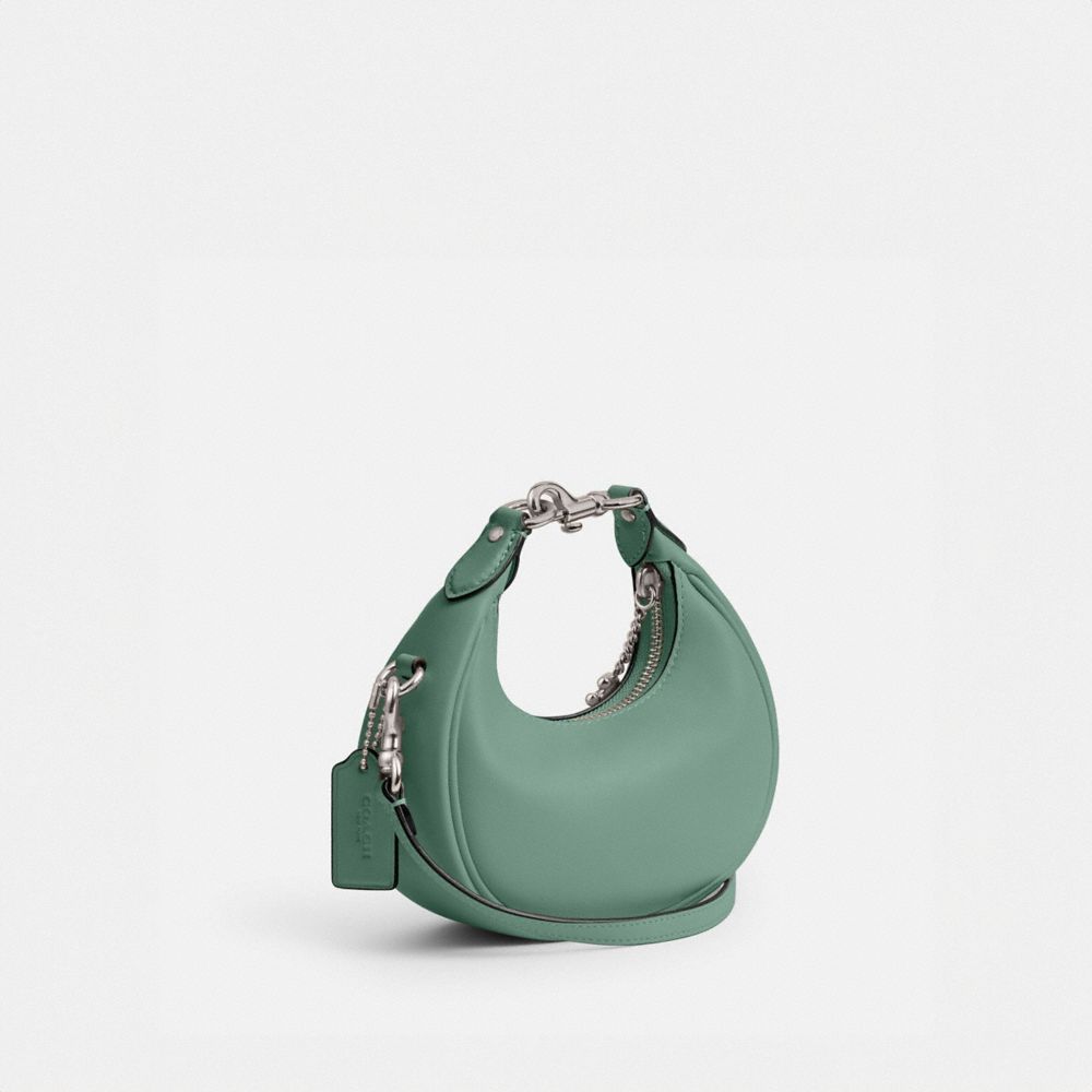 COACH®,Jonie Bag,Leather,Crossbody,Engraved Detail,Metal,Logo,Compact,Gold Metal,Day Party,,Angle View