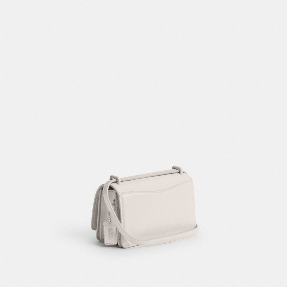 COACH®,Bandit Crossbody Bag,Calfskin Leather,Crossbody,Logo,Metal,Embossed,Adjustable,Silver Metal,Casual,White,Angle View