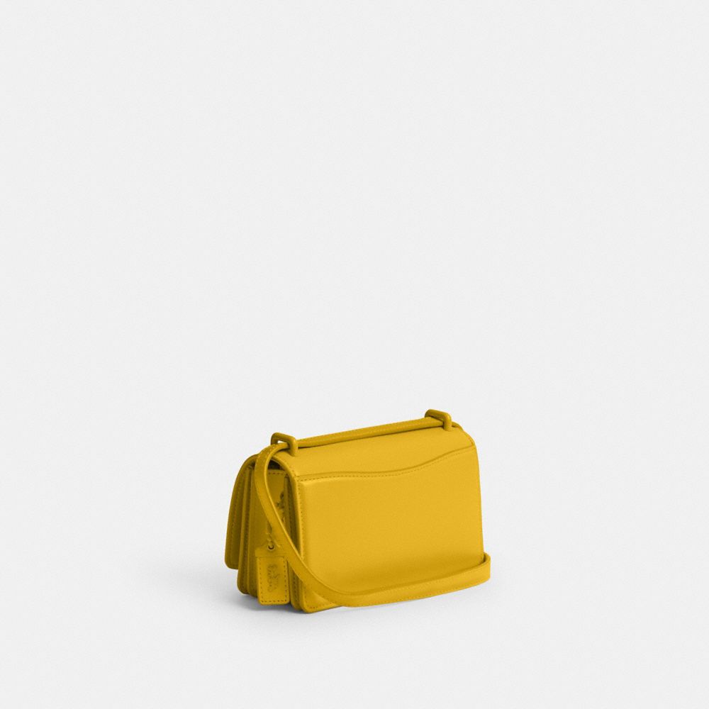 COACH®,Bandit Crossbody Bag,Leather,Calfskin Leather,Lining Leather,Crossbody,Embossed,Logo,Silver Metal,Casual,Mustard,Angle View