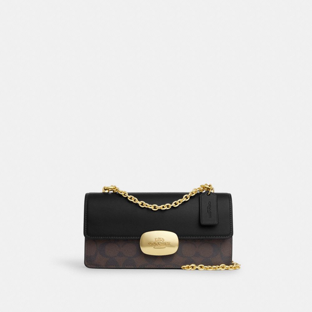 COACH®,Eliza Flap Crossbody Bag In Signature Canvas,,Front View