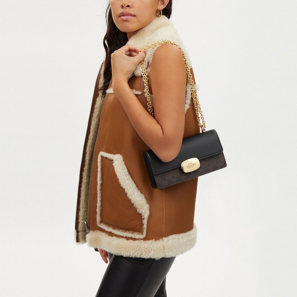 COACH®,Eliza Flap Crossbody Bag In Signature Canvas,,Detail View